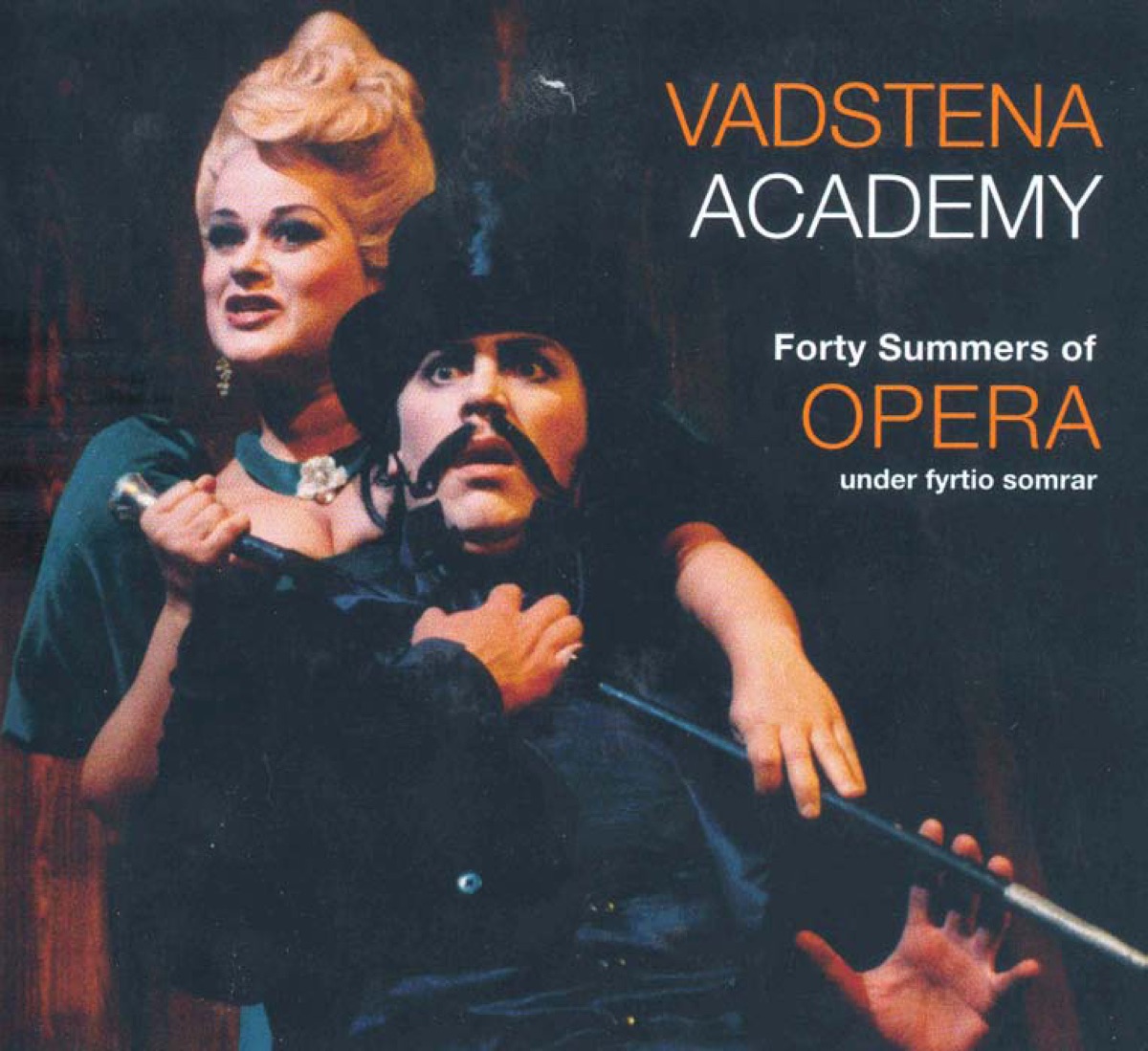 Vadstena Academy: 40 Summers of Opera by Jadwiga Koba, Lilian Sjostrand, Sven-Anders Benktsson, Vadstena Academy, Arnold Ostman, Birgitta Kallenberg, Gunilla Soderstrom, Helge Lannerback, Elisabeth Ander, Torbjorn Lillieqvist, Eva Bostrom, Ulrik Soelberg, Jan Nessler, Helena Does, Louise Werner, Christer Solén, Siw Sjoberg, Catharina Olsson, Ingeborg Nordenfelt, Annika Falk, Per-Erik Ohrn, Marriane Johansson, Gosta Zachrisson, Bo Armand Olsson, Andrew Dalton, Anita Soldh, Christina Pettersson, Gunilla Palsson, Per-Arne Wahlgren, Stefan Dahlberg, Bjorn Hallman, Iwa Sorenson, Roger Wagsjo, Bo Johan Leinmark, Carina Stranberg, Orjan Nasbom, Mari Anne Haggander, Tord Wallstrom, Irene Almen, Elisabeth Weman, Carina Morling, Stefan Parkman, Birgitta Larsson, Eva Hallberg, Olle Skold, Mikael Samuelson, Anne Sofie von Otter, Christina Falk, Thomas Lander, Lars Magnusson, Hillevi Martinpelto, Lage Wedin, Marianne Eklof, Charlotta Nilsson, Lena Nordin, Asa Mockle-Wall, Birgitta Lundkvist, Olav Anton Thommessen, Bengt Nordfors, Anders Wiklund, Magnus Kyhle, Bjorn Stockhaus, Sven H. Aberg, Gertrud Hoffstedt, Sven G. Aberg, Glenn Mossop, Gunnar Lundberg, Eva-Maria Tersson, Pia-Marie Nilsson, Elizabeth Hehr, Lollo Ohlsson, Mikael Bellini, Anders Lorentzson, Charlotta Huldt, Anders Öhrwall, Anders Melander, Linnea Sallay, Angela Rotondo, David Aler, Jonas Degerfeldt, Stefan Dassman, Stina Tornberg, Tomas Lind, Lennart Forsen, Dag Metin Ardel, Sigrid Holmquist, Per Borin, Pia-Lena Andersson, Michael Axelsson, Ingegerd Nilsson, Carl Unander-Scharin, Barbro Netin, Iwar Bergkwist, Graham Treacher, Greger Erdos, Alan Hacker, Lars Palerius, Thomas Schuback, Kristina Eriksson-Martling, Tommy Lagg, Jeanette Bjurling, Anna Eklund-Tarantino, Birgitta Petersson, Susanne Ryden, Ann-christine Larsson, Mark Tatlow, Johnny van Hal, Marcus Jupither, Lars Arvidson, B. Tommy Andersson, Charlotta Larsson, Clas Pehrsson, Karin Ingeback, Nina Stemme, Malin Gjorup, Staffan Larson, Ann Hallenberg, Katarina Andersson-Arvidson, Petter Sundkvist, Michael Weinius, Sara Olsson, Annika Nerfont, Bengt Jarnblad, Stefan Nymark, Michael Bartosch, Bo Rosenkull, Lars Hallgren, Alexandra Orrgard Solen, Patrik Wirefeldt, Tua Aberg, Karin Frolen, Clara Bystrand, Mats Persson, Camilla Tilling, Staffan Galli, Ola Eliasson, Yvonne Tuvesson-Rosenqvist, Malena Ernman, Jesper Taube, Maria Gustafsson, Olof Boman, Maria Hedstrom, Klara Ek, Ingela Bohlin, Vadstena Academy Choir, Alexander Niclasson, Magnus Ahlstrom, Lars Johansson, Tove Dahlberg, Johan Hallsten, Cecilia Rydinger Alin, Elisabet Strid, Catarina Lundgren, David Björkman, Nikola Matisic, Henrik Holmberg, Karolina Blixt, Robert Vetander, Signe Sannem Lund, Mattias Nilsson, Daniel Hallstrom, Jakob Hogstrom, Andreas Lundmark, Andreas Landin, Karl Rombo, Karl Etti, Carl Johan Falkman, Britt-Marie Aruhn, Maud Hammerud, Mats Andersson, Thomas Sunnegardh, Magnus Linden, Annete Roth, Sten Niclasson, Mark Bartholdsson, Olle Persson, Fredrik Zetterstrom, Anna Larsson, Katija Dragojevic, Olof Lilja, Anna Hanning, Christina Hornell, Gregor Bergman, Maria Sanner, Mia Karlsson, Conny Thimander & David Johansson album cover