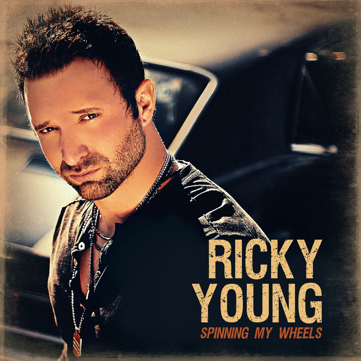 Spinning My Wheels by Ricky Young album cover