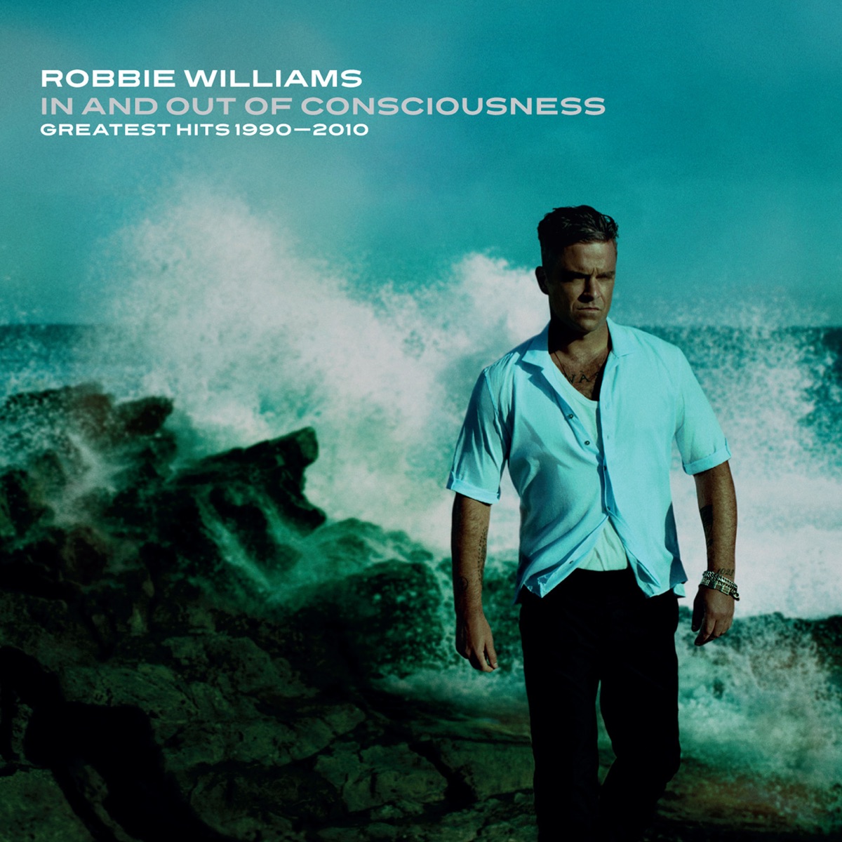 In and Out of Consciousness: Greatest Hits 1990 - 2010 by Robbie Williams album cover