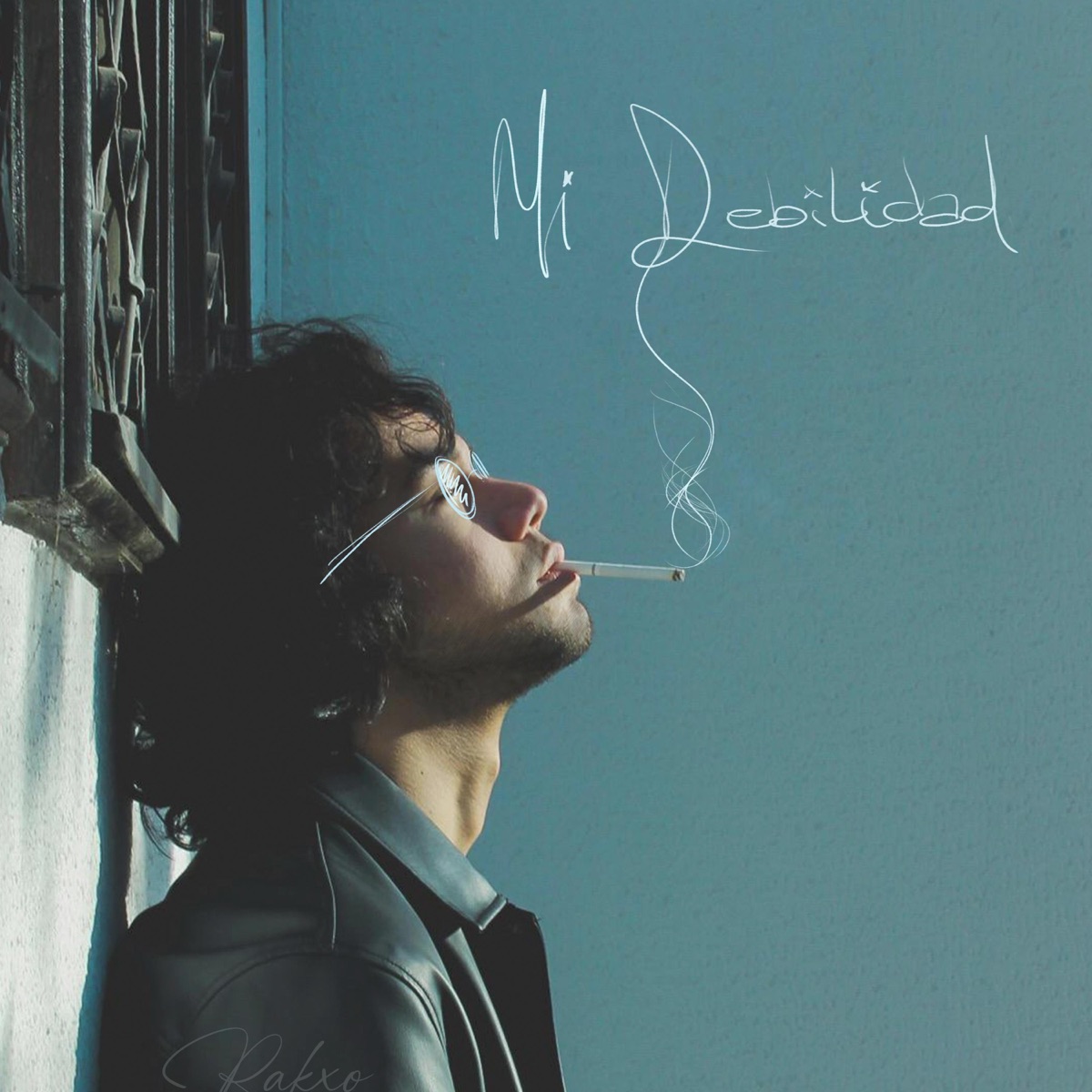 Mi debilidad - Single by Rakxo album cover